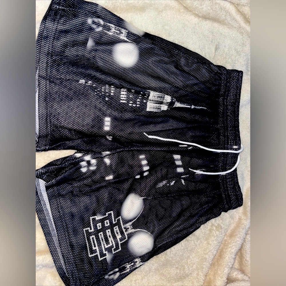 Elevate your summer wardrobe with these stylish Eric Emanuel shorts in classic